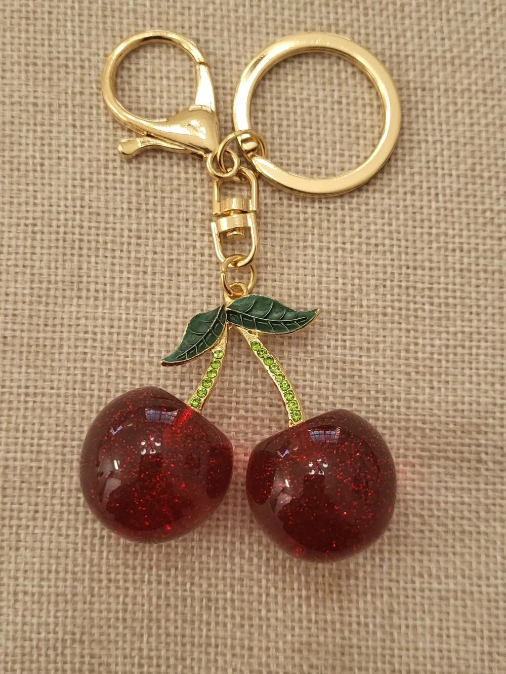 Gold-Tone Red Cherry Keychain with Green Accents